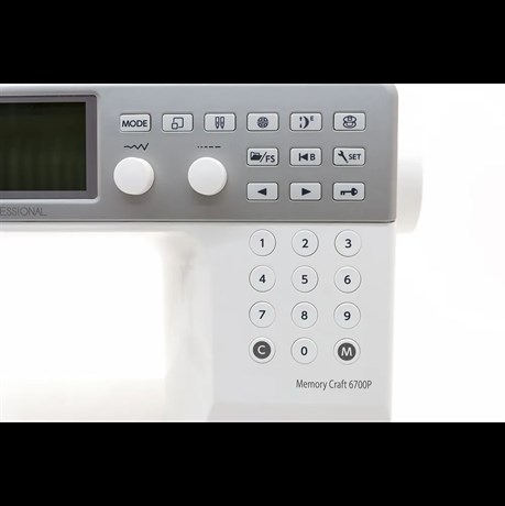 фото: Швейная машина Janome Memory Craft 6700P